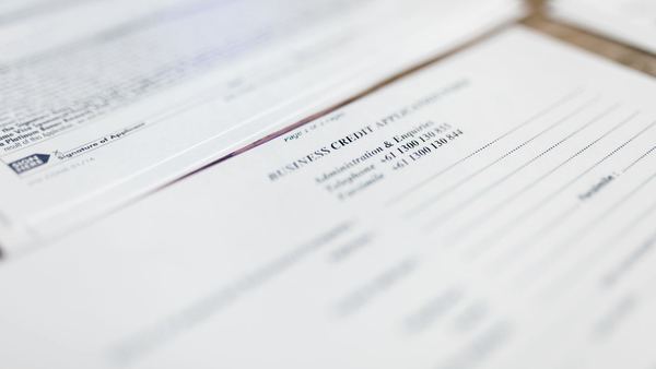 A printed multi-part form on a desk.